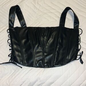 New with tags cute faux leather top.